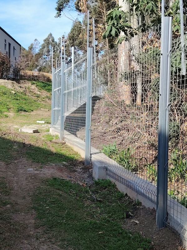 Clearview fence on a retaining plinth — Jozelle Fencing & Projects