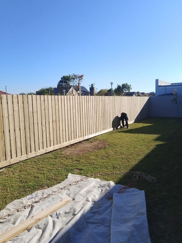 Timber-look fence and lawn — Jozelle Fencing & Projects